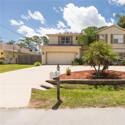 Buy this 5 bed house on 52 Raleigh Drive in Palm Coast, FL 32164