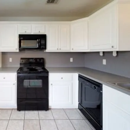 Rent this 4 bed apartment on 2404 Trace Mdws in Steeplechase, College Station