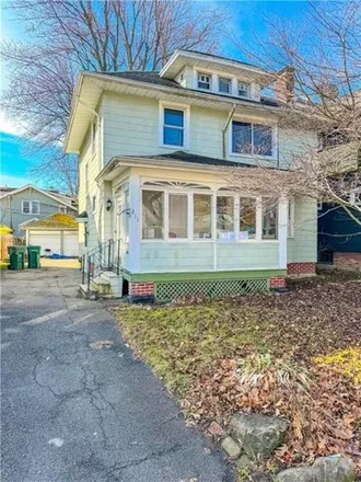 Buy this 3 bed house on 211 Ellicott Street in City of Rochester, NY 14619