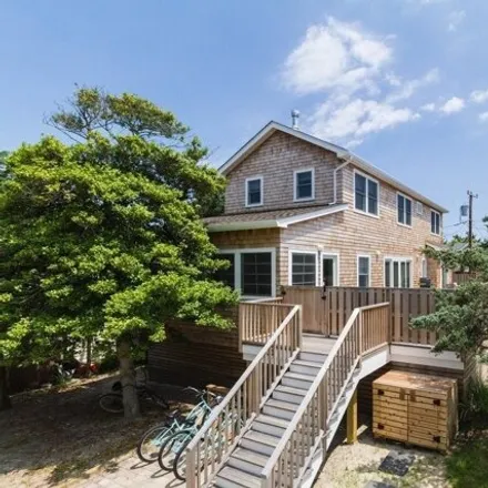 Rent this 4 bed house on 109 Bungalow Walk in Village of Ocean Beach, Islip
