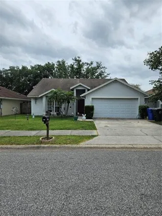 Buy this 3 bed house on 1124 Sugarberry Trail in Alafaya Woods, Oviedo