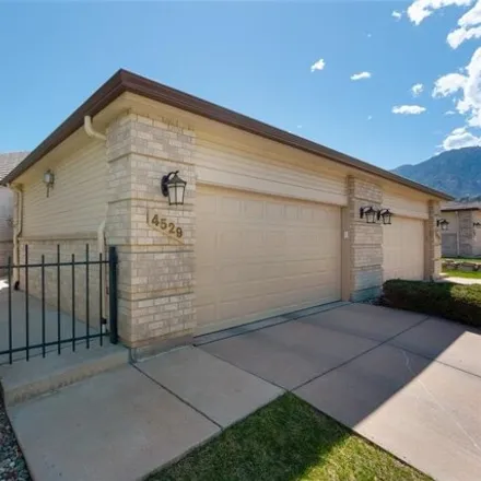 Buy this 4 bed house on Songglen Circle in Colorado Springs, CO 80902