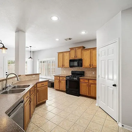 Rent this 3 bed apartment on 15281 Henderson Point Drive in Harris County, TX 77429