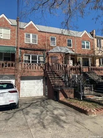 Buy this 4 bed house on 1161 86th Street in New York, NY 11228