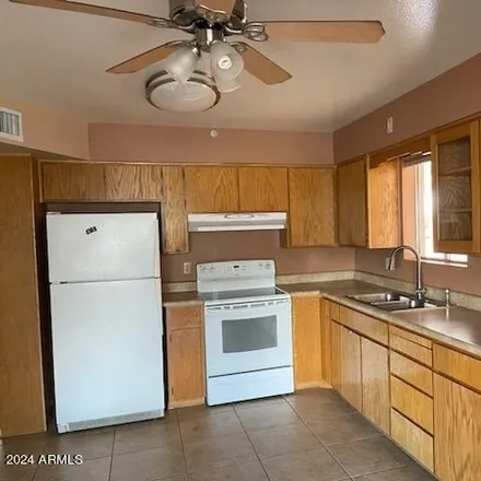 Rent this 2 bed house on 6034 East Albany Street in Mesa, AZ 85205