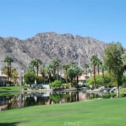 Rent this 2 bed condo on 55441 Tanglewood in La Quinta, CA 92253