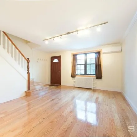 Rent this 2 bed townhouse on 20-33 28th Street in New York, NY 11105