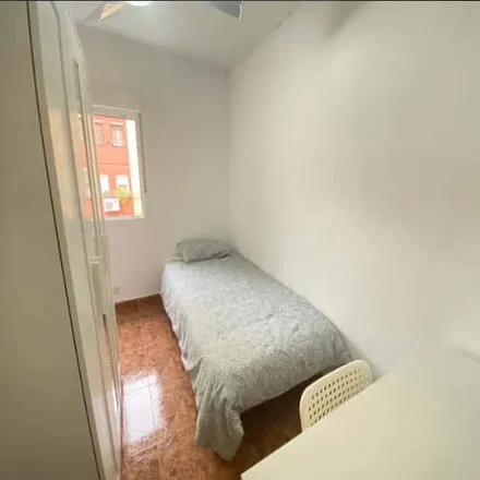 Rent this 4 bed room on Madrid in Calle López Grass, 66