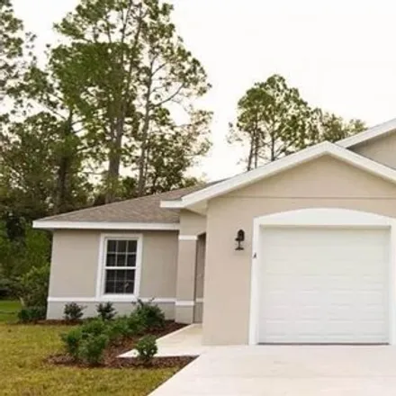 Rent this 3 bed house on 99 Rose Drive in Palm Coast, FL 32164