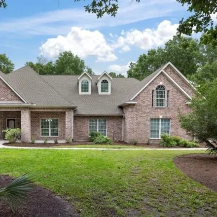 Buy this 4 bed house on 28388 Woodsons Lake Drive in Montgomery County, TX 77386