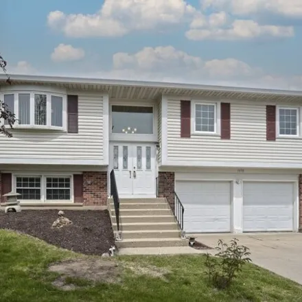 Buy this 4 bed house on 1678 Berkshire Street in Glendale Heights, IL 60139