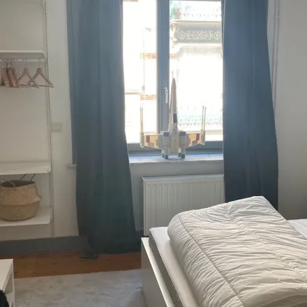 Rent this 8 bed room on Rue de l'Orient - Morgenlandstraat 105 in 1040 Etterbeek, Belgium