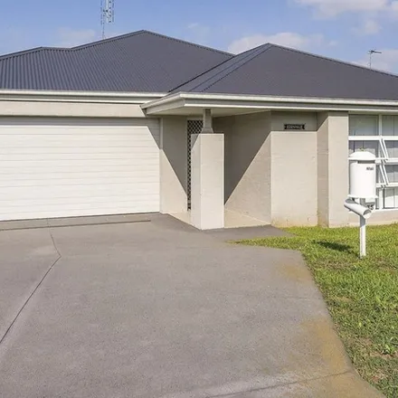 Rent this 4 bed apartment on Birch Grove in Aberglasslyn NSW 2320, Australia
