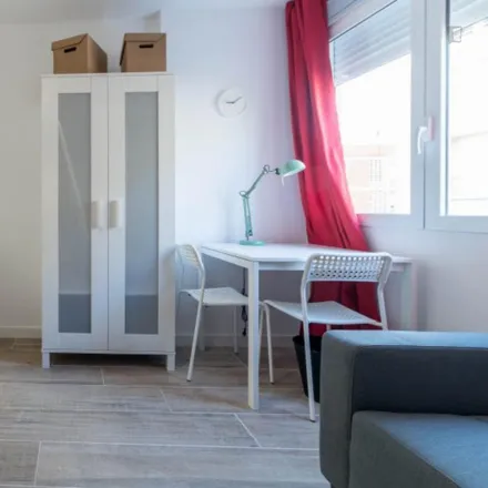 Rent this 4 bed room on Carrer de Benicarló in 30, 46020 Valencia