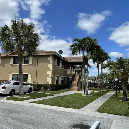 Rent this 2 bed condo on 2677 Northwest 82nd Terrace in Coral Springs, FL 33065