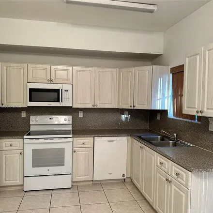 Rent this 4 bed apartment on unnamed road in Miami-Dade County, FL 33174