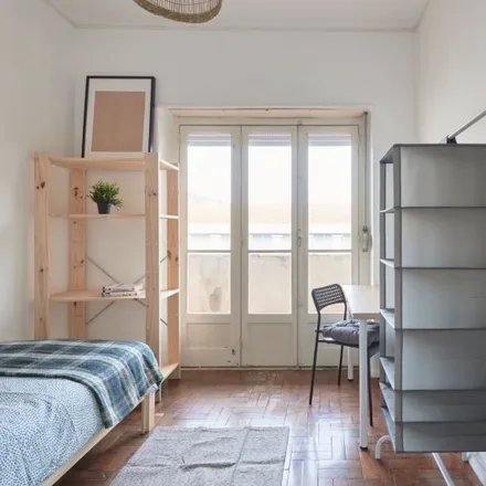 Rent this 6 bed room on Rua Tristão Vaz 8 in 1400-191 Lisbon, Portugal