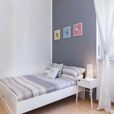 Rent this 4 bed room on Via dei Salici 7 in 20090 Cesano Boscone MI, Italy