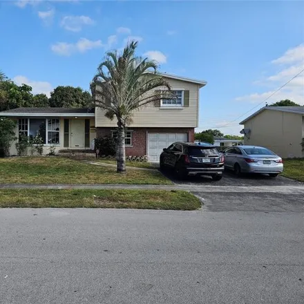 Buy this 4 bed house on 6795 Southwest 6th Street in Pembroke Pines, FL 33023