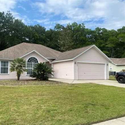 Rent this 3 bed house on 8570 Southwest 57th Lane in Alachua County, FL 32608