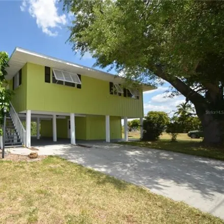 Buy this 3 bed house on 24430 Treasure Island Boulevard in Pirate Harbor, Charlotte County