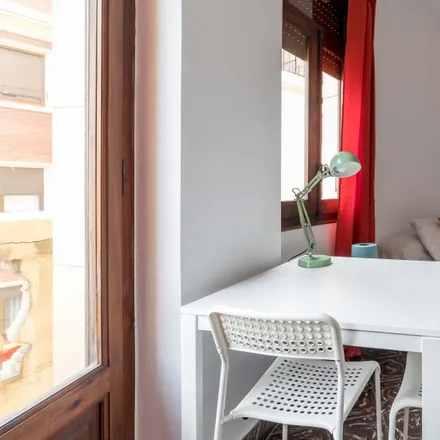 Rent this 8 bed room on Neural in Carrer de Guillem de Castro, 46008 Valencia