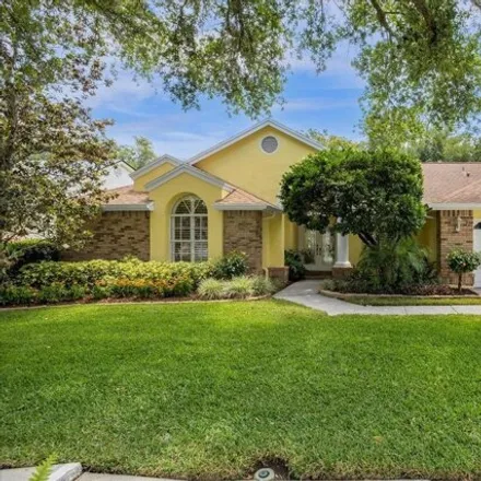 Buy this 5 bed house on 5606 Pine Bay Drive in Citrus Park, FL 33625