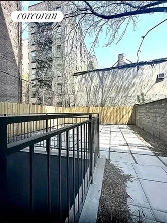 Rent this 2 bed house on 223 East 117th Street in New York, NY 10035