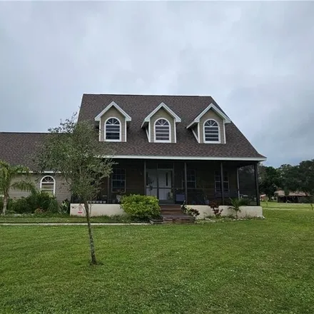 Buy this 5 bed house on 3261 River Grove Circle in Lee County, FL 33905