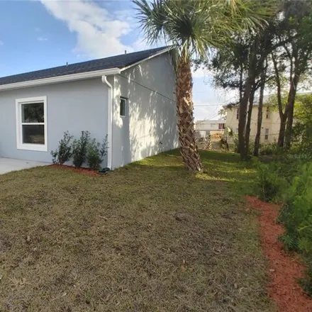 Rent this 3 bed house on 131 Hummingbird St Apt 2 in Deltona, Florida