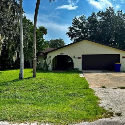 Buy this 3 bed house on 1865 Orange Tree Dr in Edgewater, Florida