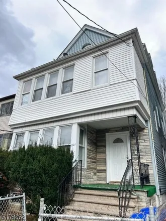 Buy this 8 bed townhouse on 818 Parker Street in Newark, NJ 07104
