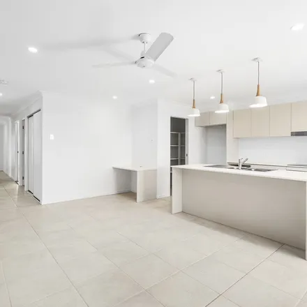 Rent this 4 bed apartment on Delaway Street in Chambers Flat QLD 4125, Australia