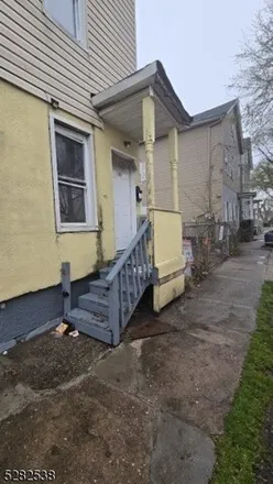 Rent this 3 bed house on 165 Clinton Street in Paterson, NJ 07522