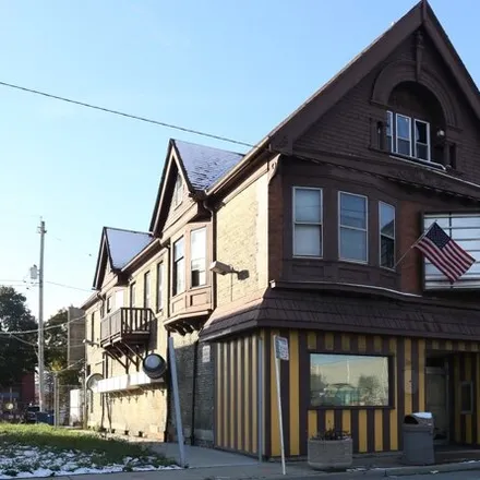 Buy this studio house on Gold Rush Chicken in 2625, 2627 West North Avenue