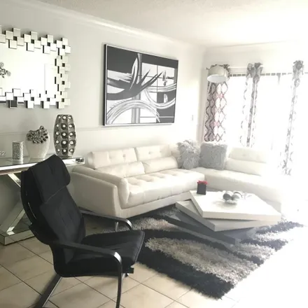 Rent this 2 bed condo on 401 West 49th Street in Palm Springs, Hialeah