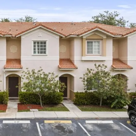 Buy this 2 bed townhouse on 8877 South Isles Circle in Tamarac, FL 33321