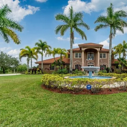 Buy this 5 bed house on 5628 Lago del Sol Drive in Palm Beach County, FL 33449