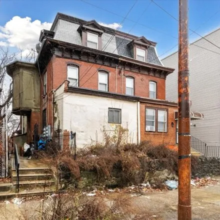 Buy this 6 bed house on Resurrection Baptist Church in 1610 North 54th Street, Philadelphia