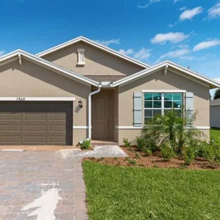 Rent this 4 bed house on Northeast Skyhigh Terrace in Ocean Breeze, Martin County