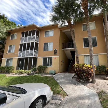Rent this 3 bed condo on West McNab Road in Pompano Beach, FL 33069