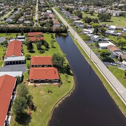 Buy this 2 bed condo on 2056 Pine Isle Lane in Collier County, FL 34112