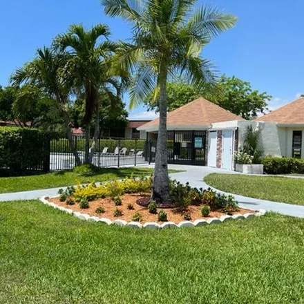 Rent this 2 bed apartment on 9952 Three Lakes Circle in Palm Beach County, FL 33428