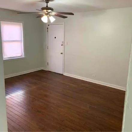 Rent this 2 bed apartment on 7648 S. Jeffrey