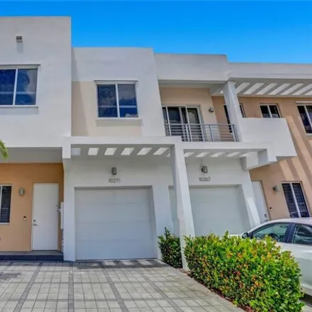 Rent this 4 bed townhouse on 10271 Northwest 72nd Street in Doral, FL 33178