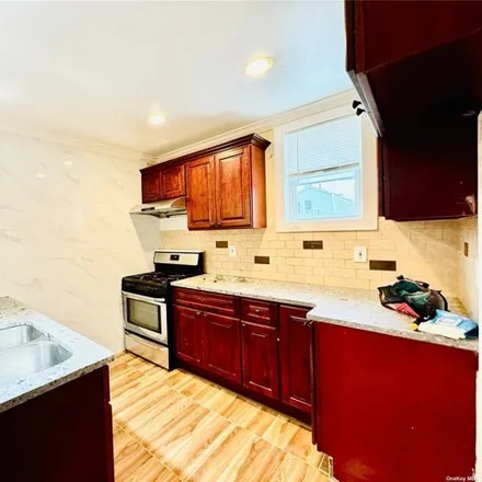 Image 3 - 32-14 98th Street, New York, NY 11369, USA - House for sale