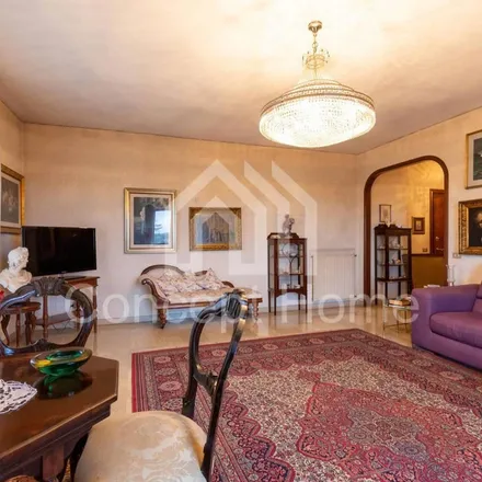 Rent this 4 bed apartment on LOFT Gastronomia E Grill in Via Elio Vittorini 69, 00144 Rome RM