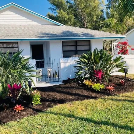 Rent this 2 bed house on 17 Aqua Ra Drive in Waveland, Saint Lucie County