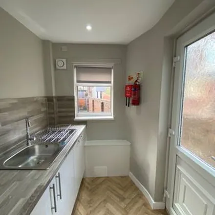 Rent this 2 bed townhouse on 37 Watts Street in Manchester, M19 2TU