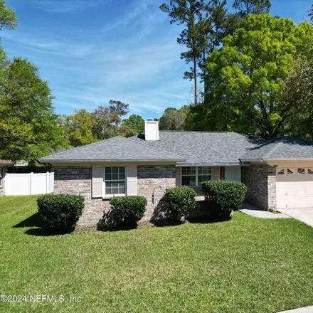 Rent this 4 bed house on 8999 Derrickson Drive in Jacksonville, FL 32210